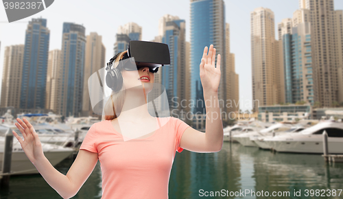 Image of woman in virtual reality headset or 3d glasses