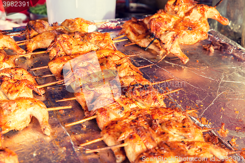 Image of chicken grill at street market