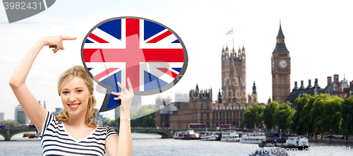 Image of woman with text bubble of british flag in london