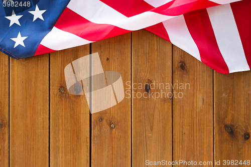 Image of close up of american flag on wooden boards