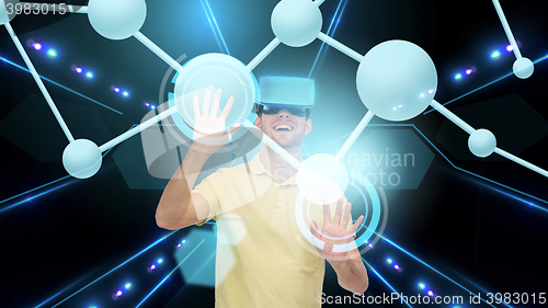 Image of happy man in virtual reality headset or 3d glasses