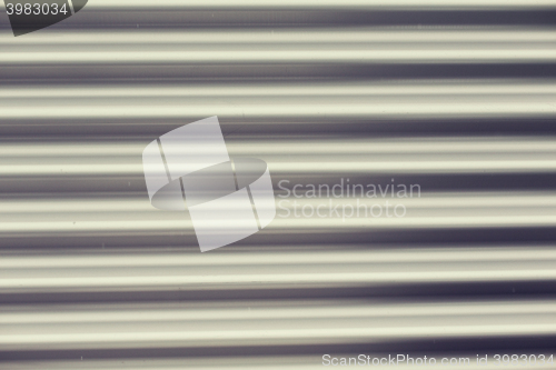 Image of close up of aluminum metal garage door backdrop