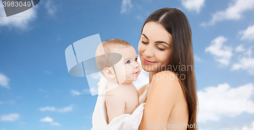 Image of happy mother holding adorable baby