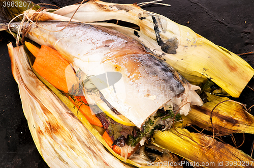 Image of Baked mackerel with vegetables and herbs