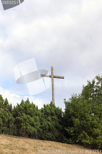 Image of wooden cross near the church