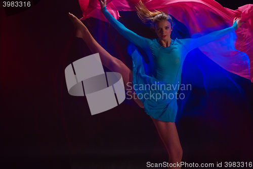 Image of The art photo-emotional dance of beautiful blue woman