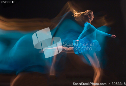 Image of The art photo-emotional dance of beautiful blue woman