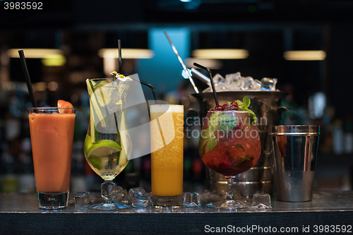 Image of cocktails on bar background