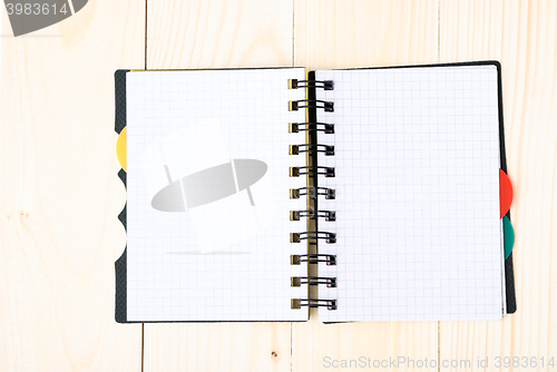 Image of notepad with pen isolated