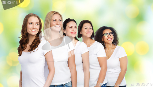 Image of group of happy different women in white t-shirts