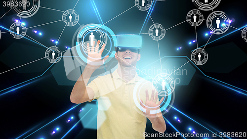 Image of happy man in virtual reality headset or 3d glasses