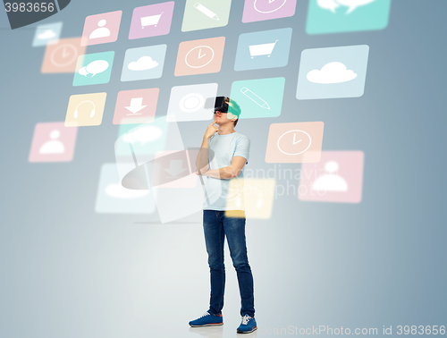 Image of happy man in virtual reality headset or 3d glasses