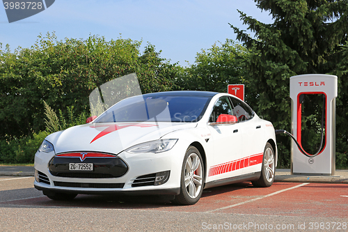 Image of Unique Design Tesla Model S Supercharging