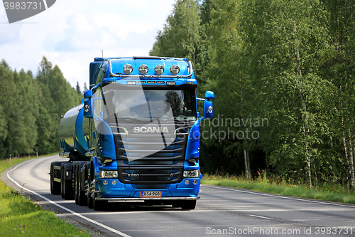 Image of Blue Scania R580 Tank Truck on Rural Road