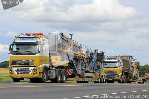 Image of Two Volvo FH16 Semi Trucks Heavy Equipment Haul