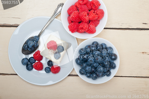 Image of fresh raspberry and blueberry cake