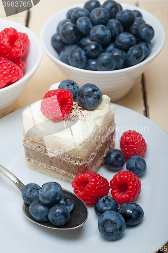 Image of fresh raspberry and blueberry cake