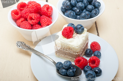 Image of fresh raspberry and blueberry cake