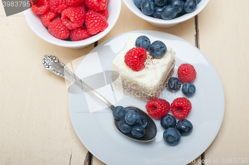 Image of fresh raspberry and blueberry cake