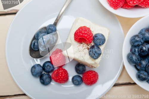 Image of fresh raspberry and blueberry cake