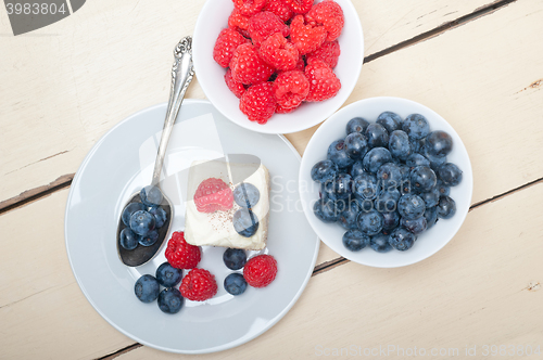 Image of fresh raspberry and blueberry cake