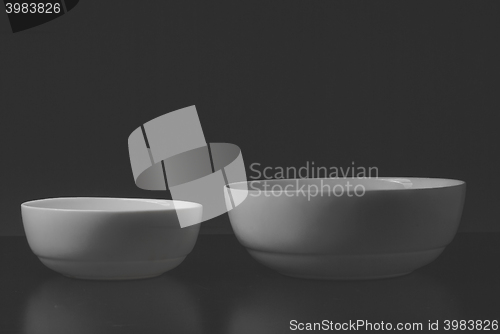 Image of white plate on black background