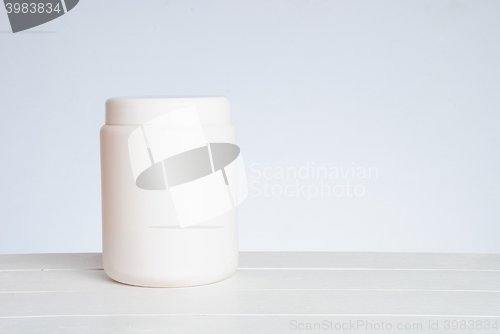 Image of White cosmetic bottle