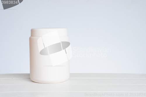 Image of White cosmetic bottle