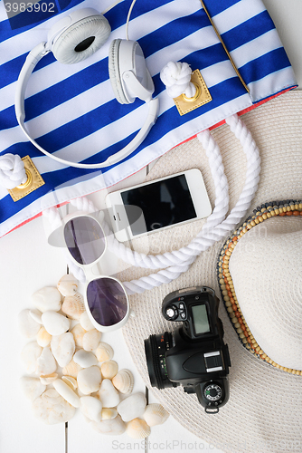 Image of beach accessories on wooden board