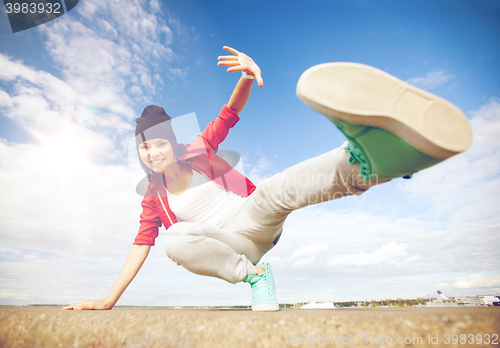 Image of beautiful dancing girl in movement