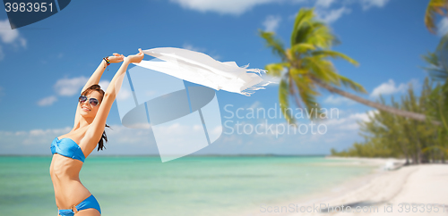 Image of woman in bikini and sunglasses