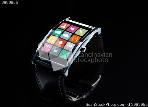 Image of close up of smart watch with menu icons on screen