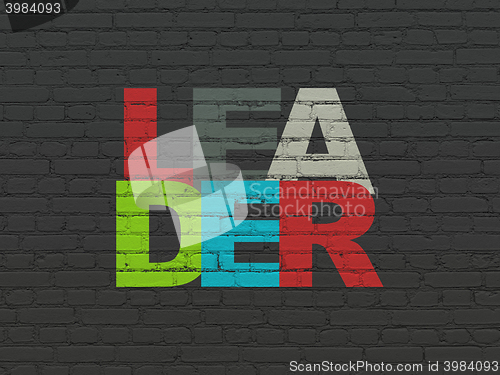 Image of Finance concept: Leader on wall background