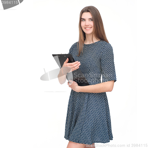 Image of Portrait of smiling business woman with paper folder