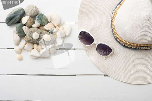 Image of beach accessories on wooden board