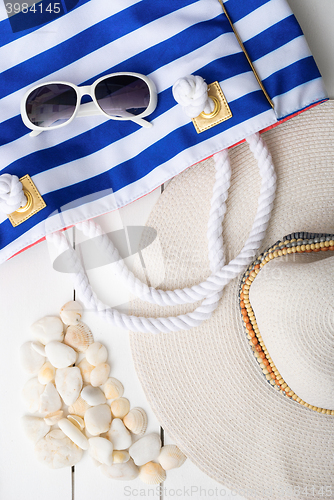 Image of beach accessories on wooden board
