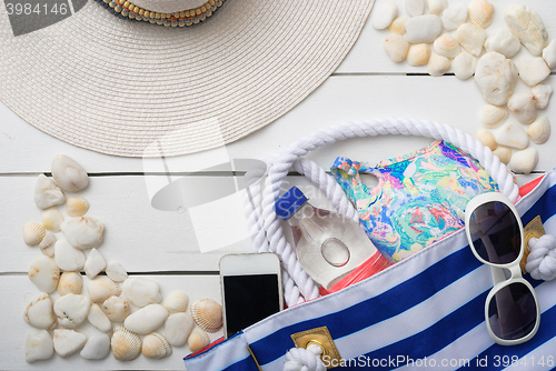 Image of beach accessories on wooden board