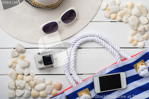 Image of beach accessories on wooden board