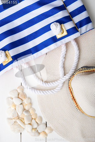 Image of beach accessories on wooden board