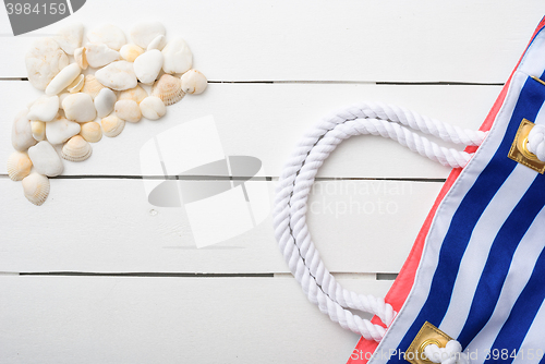 Image of beach accessories on wooden board