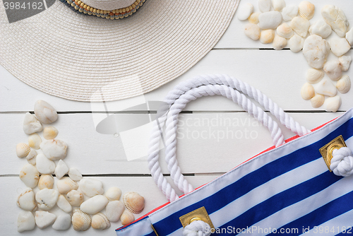 Image of beach accessories on wooden board