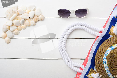 Image of beach accessories on wooden board