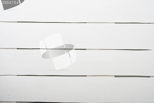 Image of White wooden planks table - background or texture