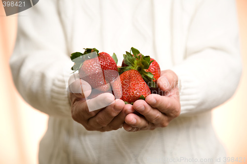 Image of Holding strawberries