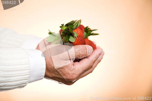 Image of Holding strawberries