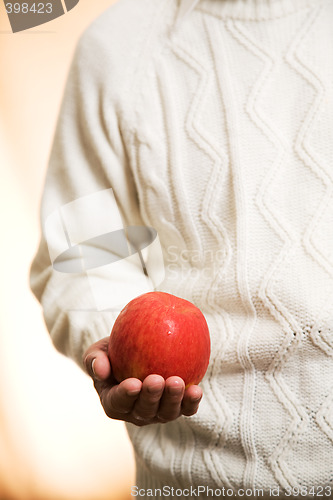 Image of Holding an apple