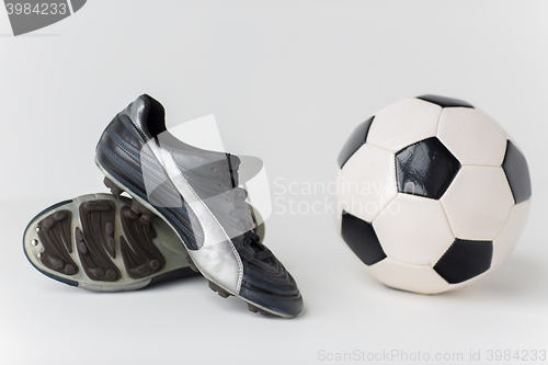 Image of close up of soccer ball and football boots