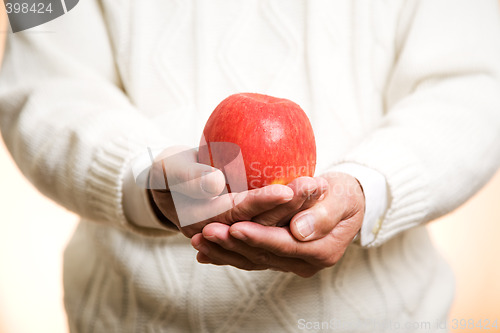 Image of Holding an apple