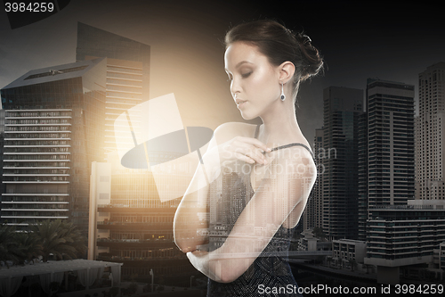 Image of beautiful young asian woman with diamond earring