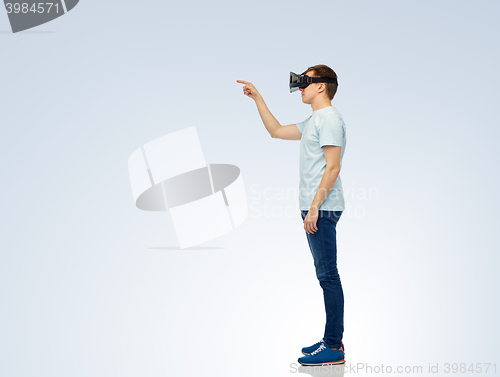 Image of happy man in virtual reality headset or 3d glasses